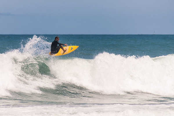 Surfing at Summerland Bay Beach
